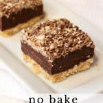 Kit kat square layered no bake dessert on a white plate