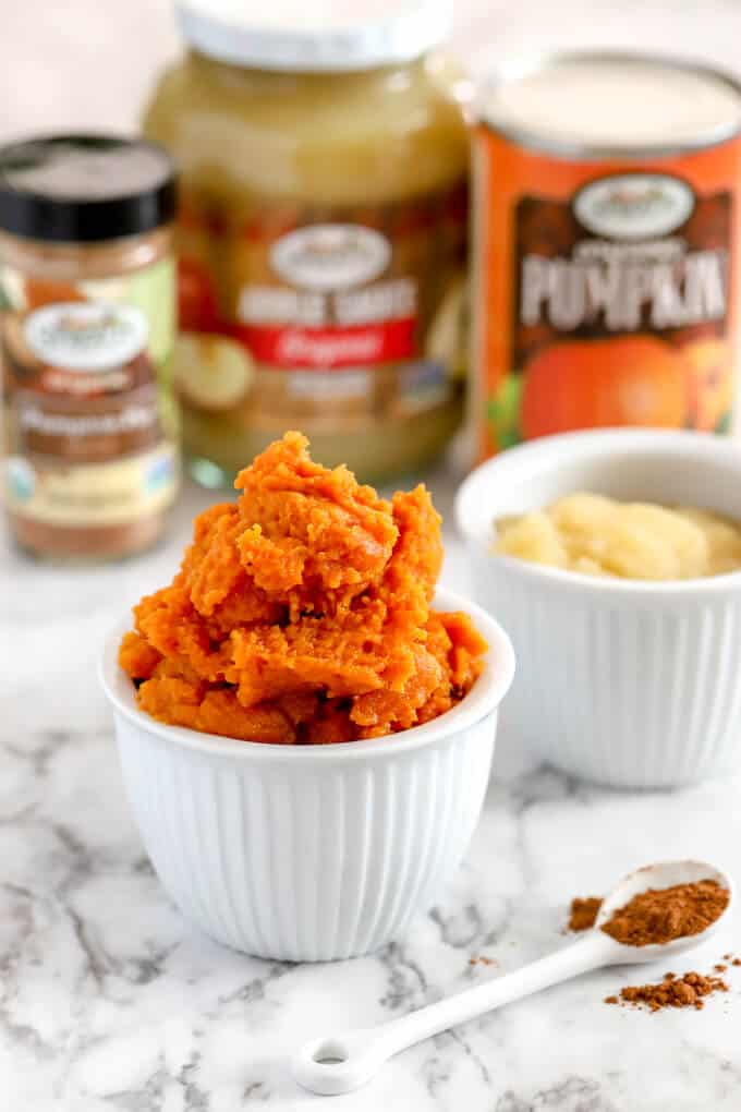 Ingredients for pumpkin fruit leather of pumpkn puree, apple sauce, and pumpkin pie spice and honey