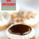 Pinterest image of one no bake cheesecake bite from mini muffin tin with chocolate sauce on top
