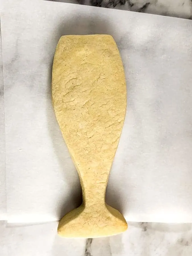 Baked cookie in the shape of a champagne flute