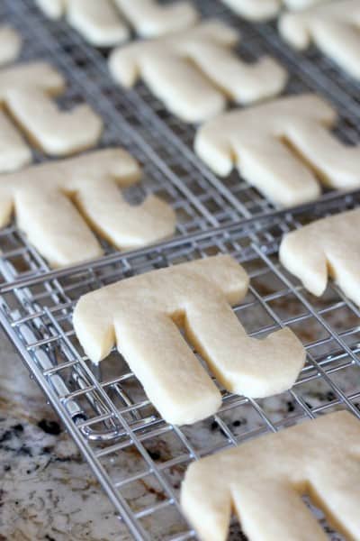 pi shaped cookies on baking cooling rack