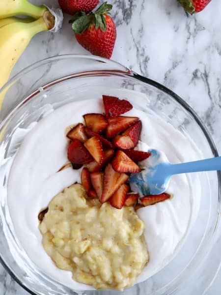 Strawberries and mashed bananas in So Delcious yogurt fruit fool recipe