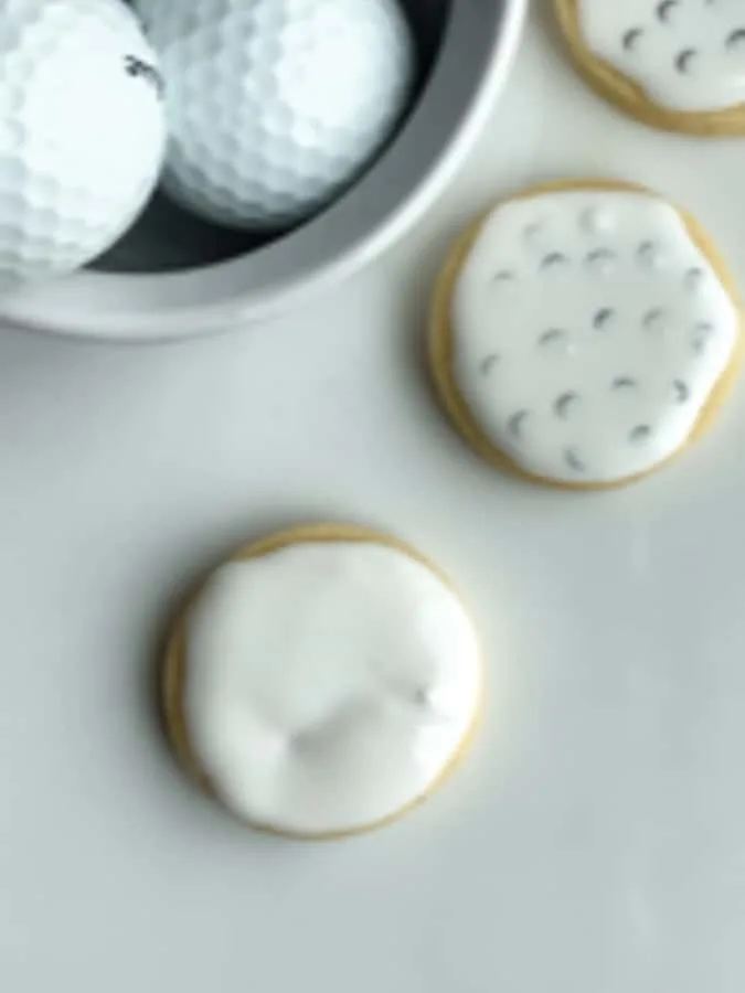 circle cookies in white royal icing