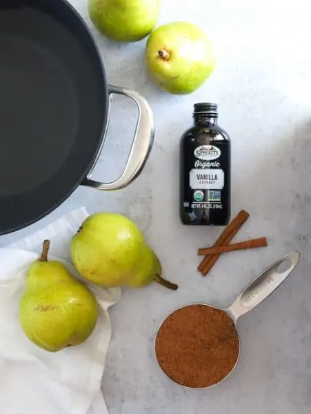 Ingredients to poach pears with vanilla and cinnamon