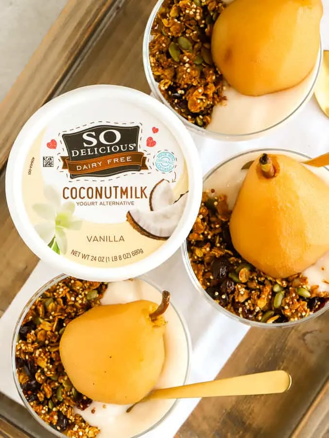 overhead photo of coconutmilk yogurt alternative and pears with granola