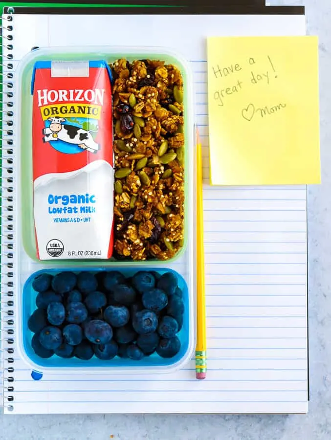 Notebook with lunch box of pumpkin granola and horizon organic milk