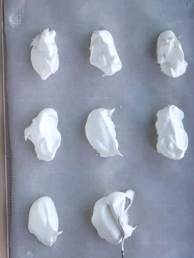 oval meringues on baking tray