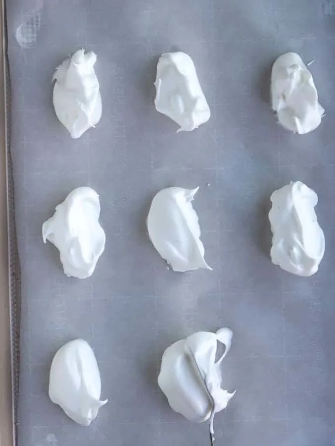 oval meringues on baking tray