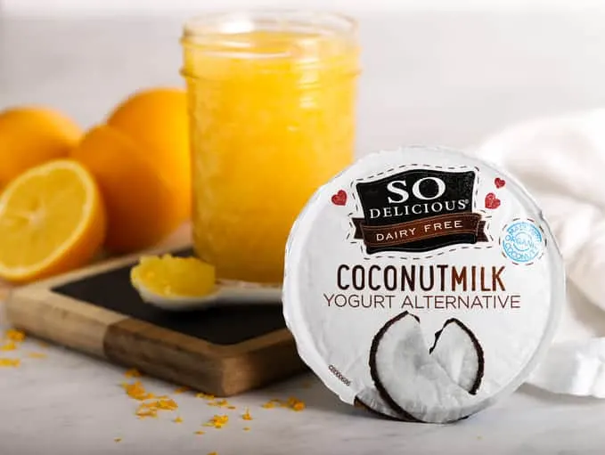 So Delicious Dairy Free Yogurt Coconutmilk with vegan lemon curd in background