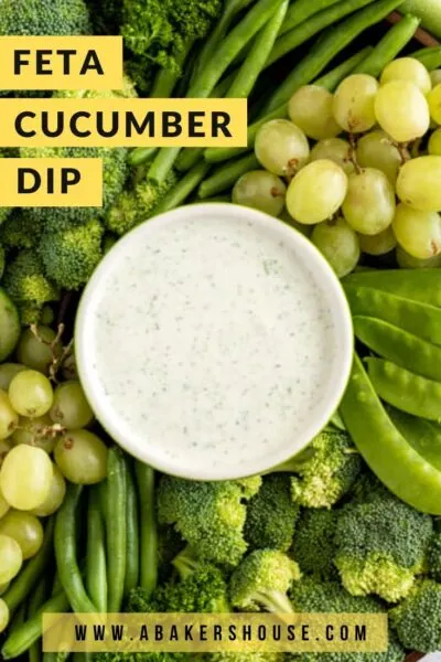 Feta Cucumber Dip with green fruits and vegetables on a platter