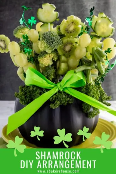 Pinterest graphic for St patrick's day fruit and vegetable arrangment