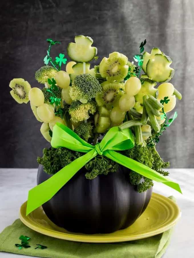 Shamrock edible arrangement with green fruits and vegetables