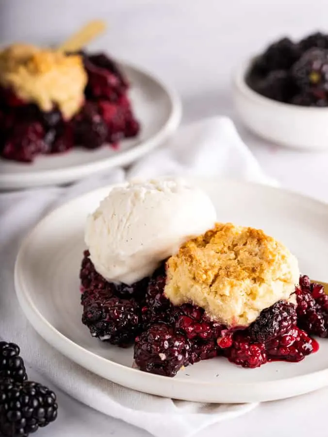 vegan blackberry cobbler on white plate