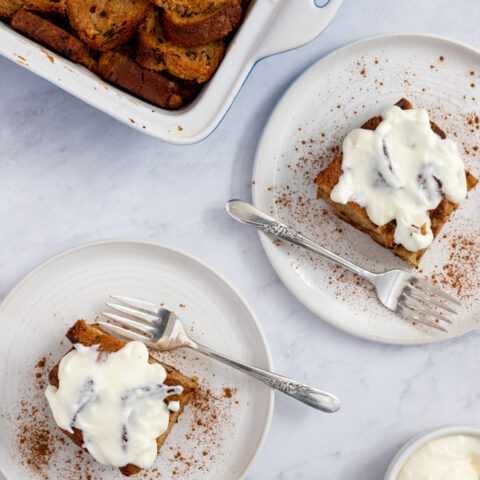 Gluten free cinnamon french toast on two plates with forks