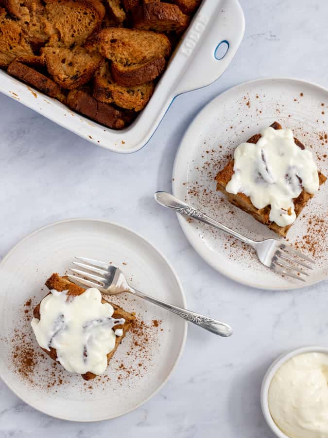 Gluten free cinnamon french toast on two plates with forks