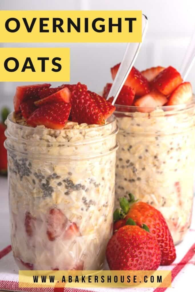two mason jars filled with overnight oats and topped with strawberries