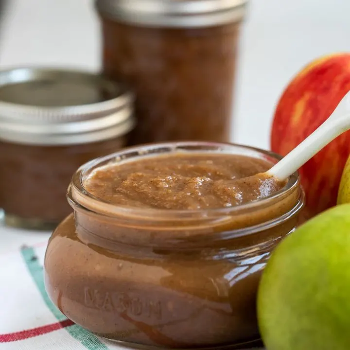 apple pear butter in mason jar next to fruit