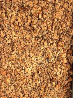 baked homemade honey granola on sheet pan