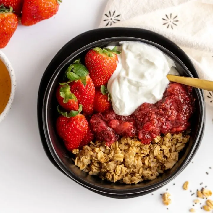yogurt bowl with berries, granola, chia jam