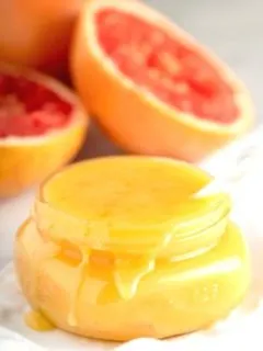 Overfilled jar of grapefruit curd size 3 by 4