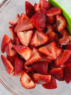 juicy strawberries in a glass bowl 3 by 4