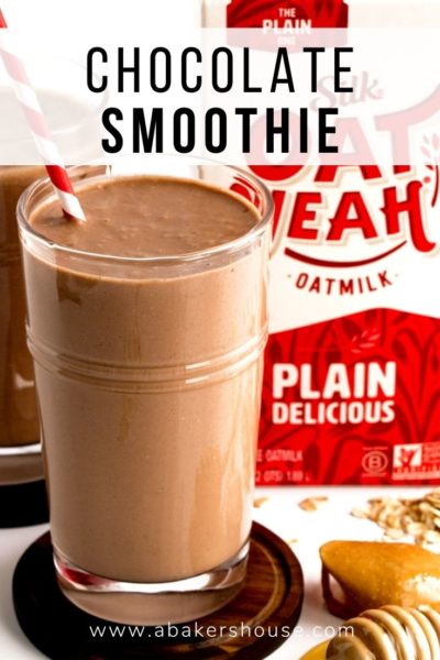 chocolate smoothie in clear tall glass with oat yeah oatmilk