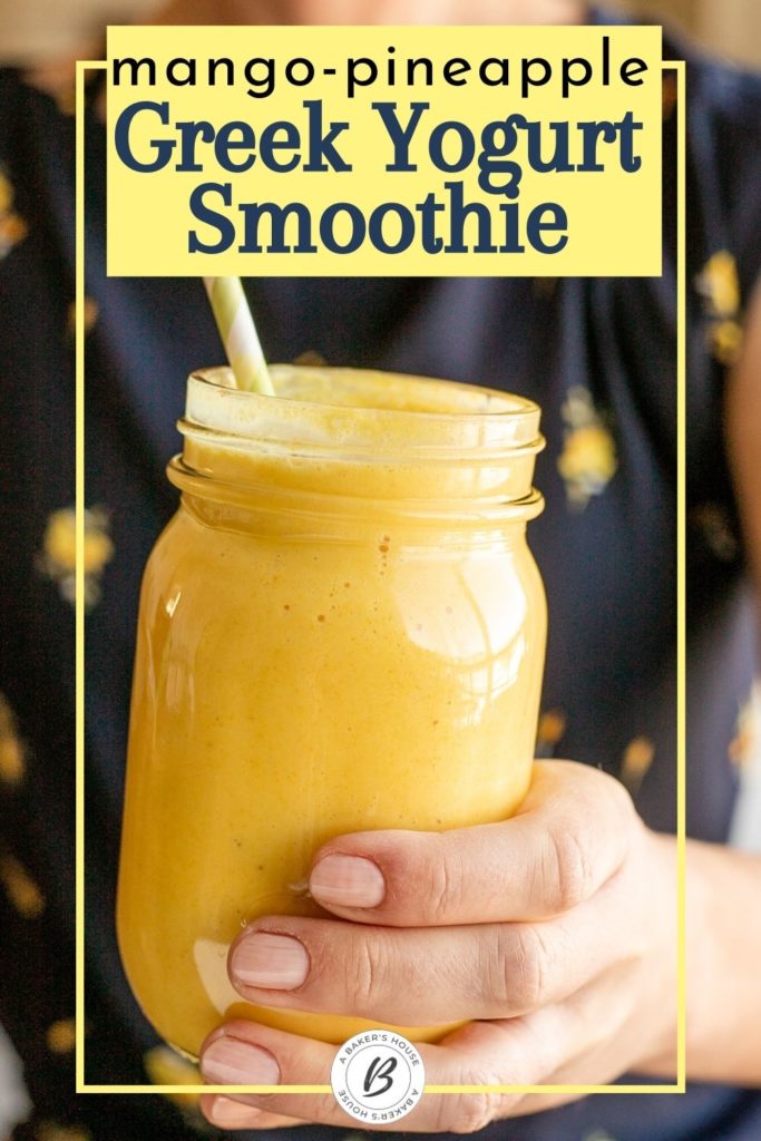 Greek yogurt smoothie with mango and pineapple in large mason jar