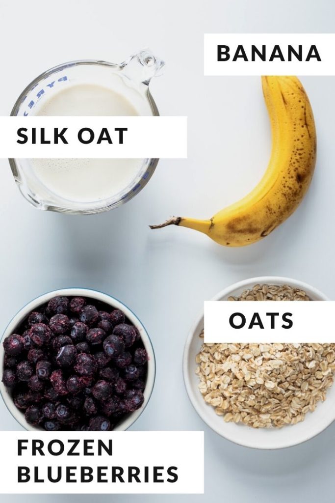 ingredients for smoothie of blueberry, banana, oatmilk and oats