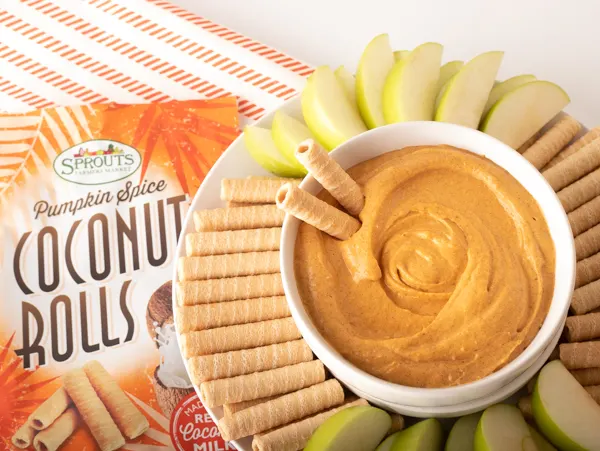 Sprouts coconut rolls and apple slices with pumpkin dip